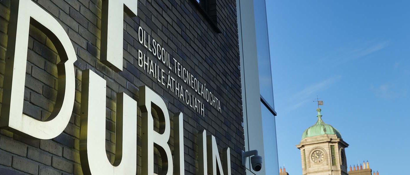 TU Dublin Brass sign east quad building Grangegorman clock tower in background